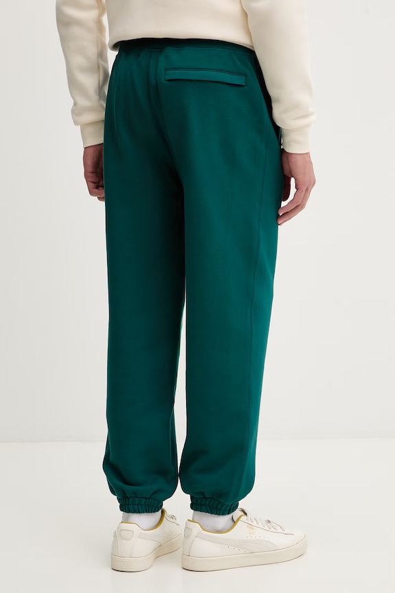 Îmbrăcăminte Puma MMQ Sweatpants pantaloni de trening pentru bărbați din bumbac 624007 turcoaz