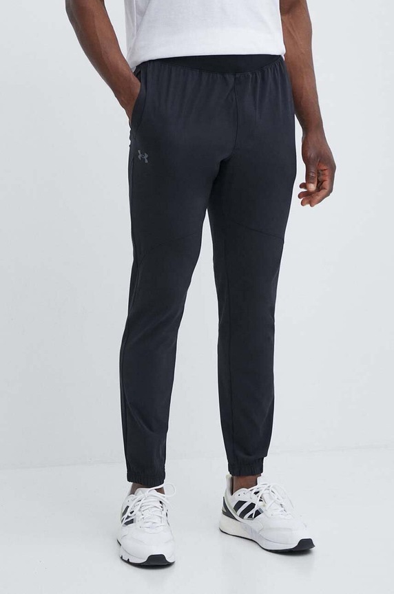 Under Armour spodnie dresowe tkanina czarny 1382119