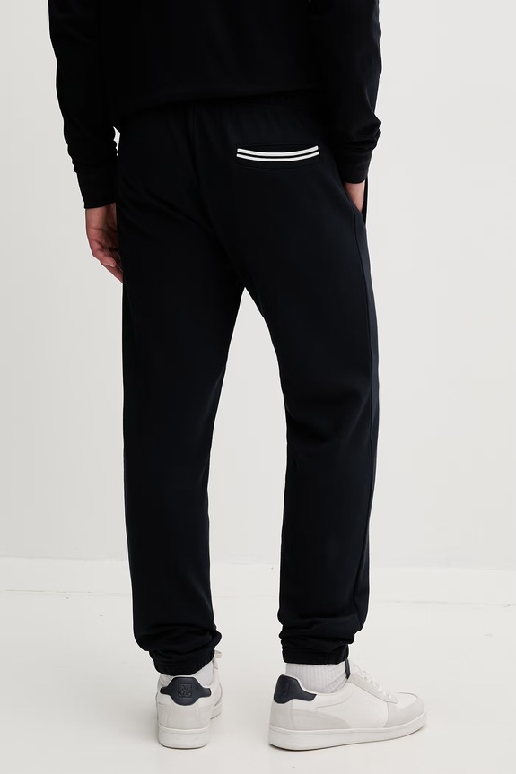 Ρούχα Βαμβακερό παντελόνι Fred Perry Loopback Sweatpant T5505.608 σκούρο μπλε