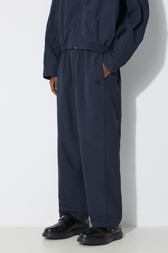 Παντελόνι AMBUSH Nylon Track Pants ύφασμα σκούρο μπλε BMCJ002S24FAB0014646