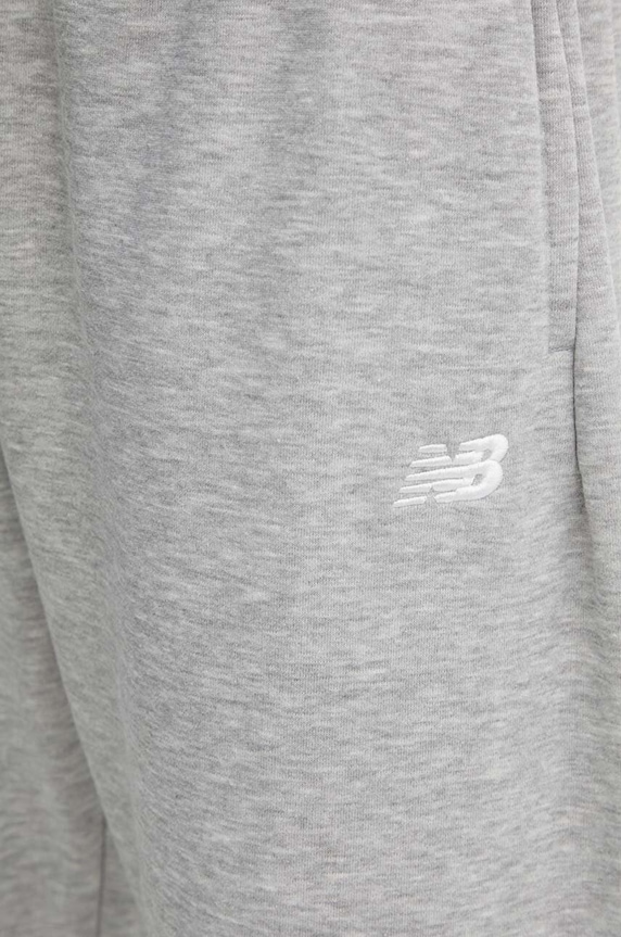 Tepláky New Balance Sport Essentials sivá MP41519AG