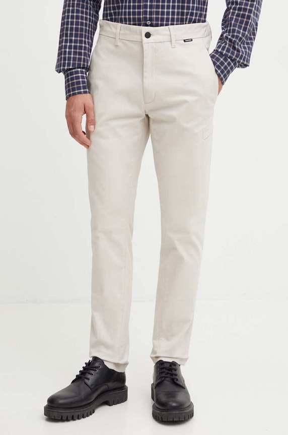 Calvin Klein spodnie z elastanem beżowy K10K112827
