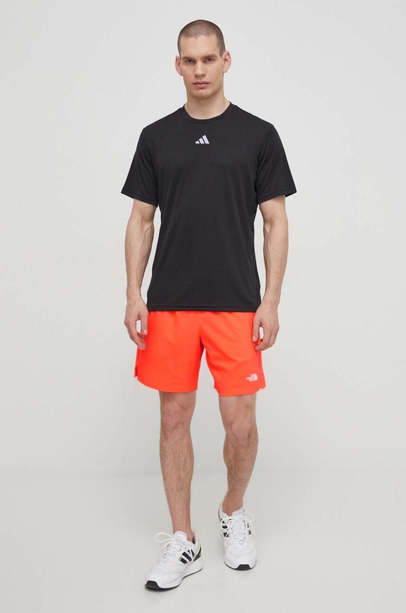 Спортен къс панталон The North Face NF0A3O1BQI41 оранжев SS24
