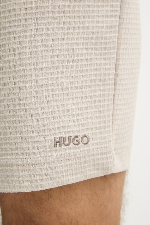 HUGO teplákové šortky pánske Austin Shorts 50532023 béžová