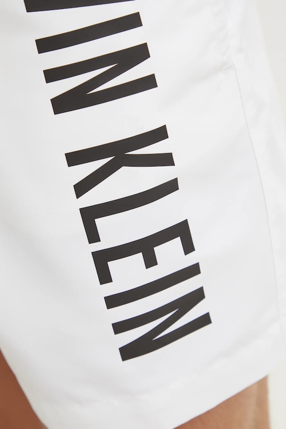 Plavkové šortky Calvin Klein bílá KM0KM01092