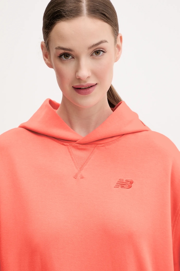 New Balance bluza bawełniana pomarańczowy WT41537DTR