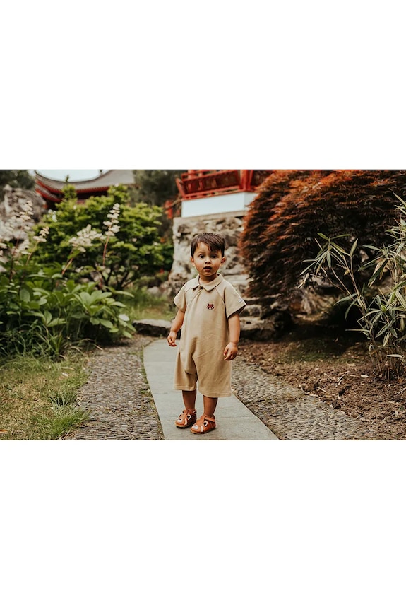 Otroški bombažni romper Donsje Adriaen Playsuit Red Panda 3035602 bež