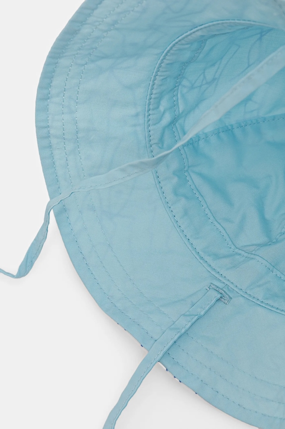 Bavlnená obojstranná detská čiapka United Colors of Benetton 65B2AA00W.W.Seasonal