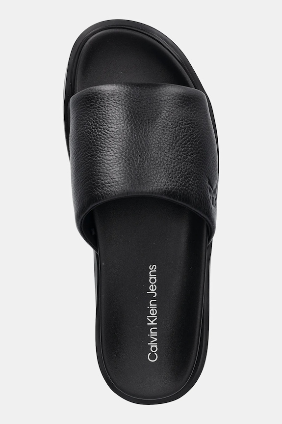 Calvin Klein Jeans papucs FLAT MOLDED SLIDE SANDAL LTH fekete YM0YM01225