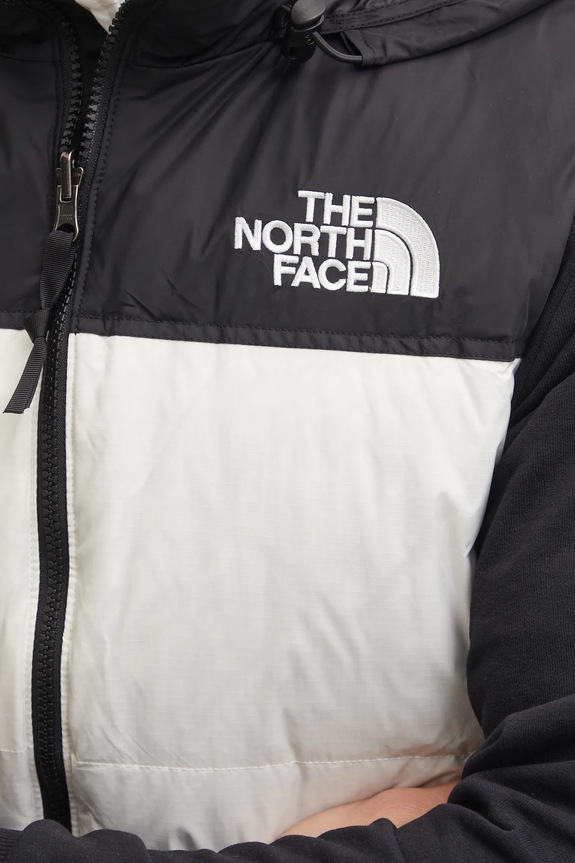 Αμάνικο από πούπουλα The North Face 1996 Retro Nuptse NF0A3JQQROU1 μπεζ