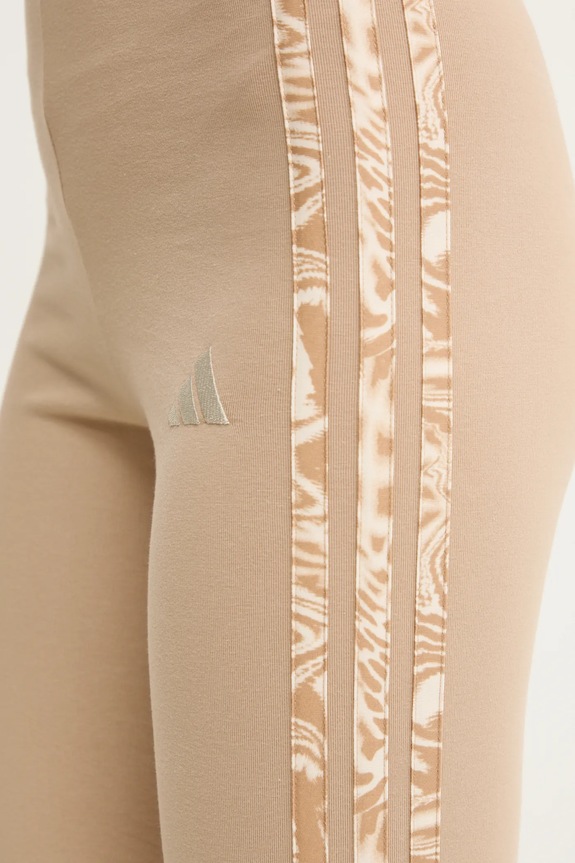 adidas legginsy Essentials Animal beżowy JM1661