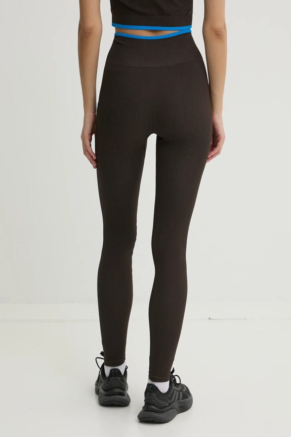 Odzież Hummel legginsy treningowe 227629 brązowy