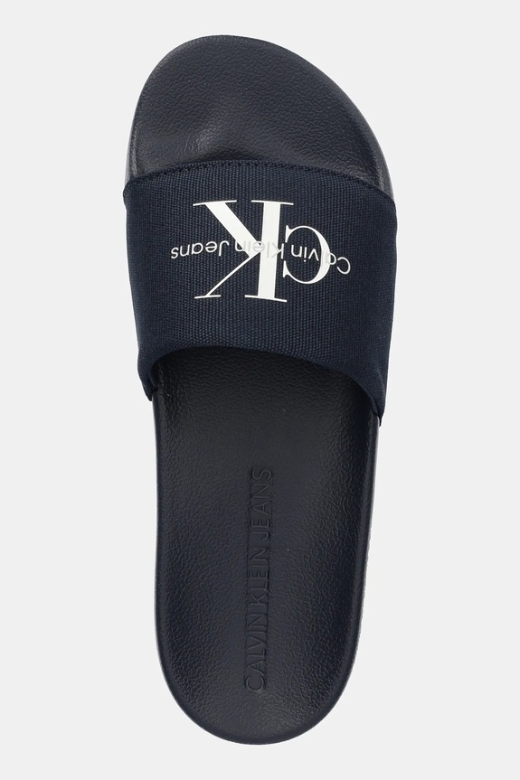Calvin Klein Jeans klapki SLIDE MONOGRAM granatowy YM0YM01271