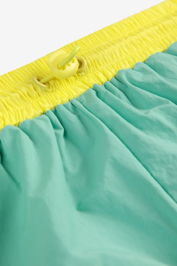 Bobo Choses pantaloni de trening pentru copii Smiling turcoaz 125AC088