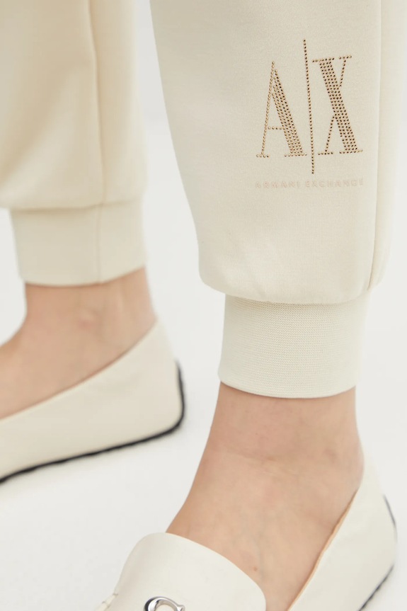 Armani Exchange spodnie dresowe beżowy XW000828.AF13397