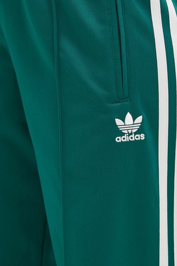 Tepláky adidas Originals Firebird zelená JC8284