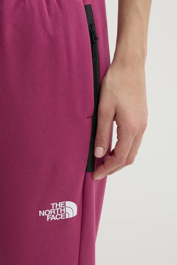 The North Face spodnie dresowe Mountain Athletics różowy NF0A893W6EO1
