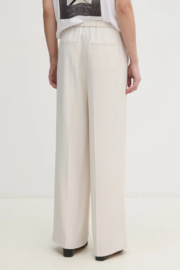 Oblečenie Nohavice Calvin Klein K20K208214 béžová