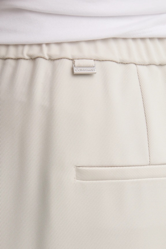Nohavice Calvin Klein béžová K20K208214