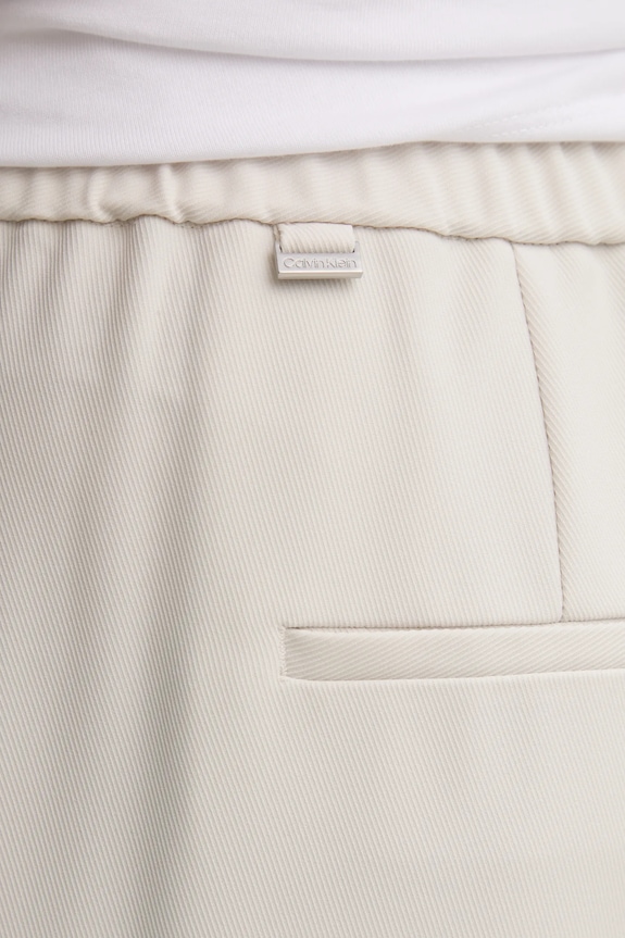 Nohavice Calvin Klein béžová K20K208214