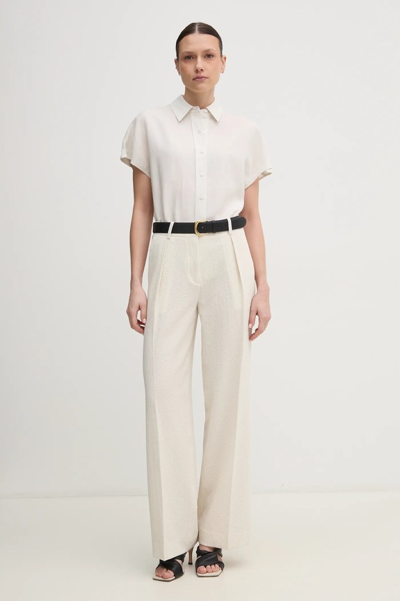 Calvin Klein spodnie K20K208217 beżowy SS25