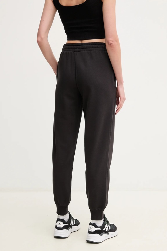 Ρούχα Παντελόνι φόρμας Puma 685037. μαύρο