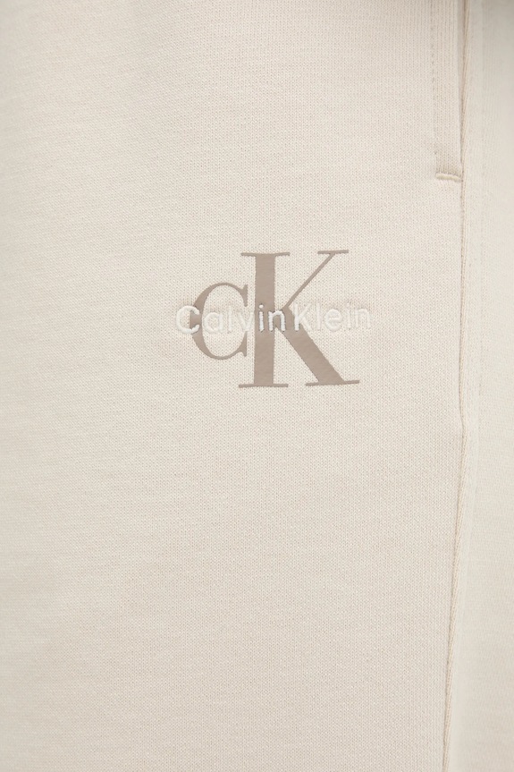 Tepláky Calvin Klein Jeans béžová LV047B235G