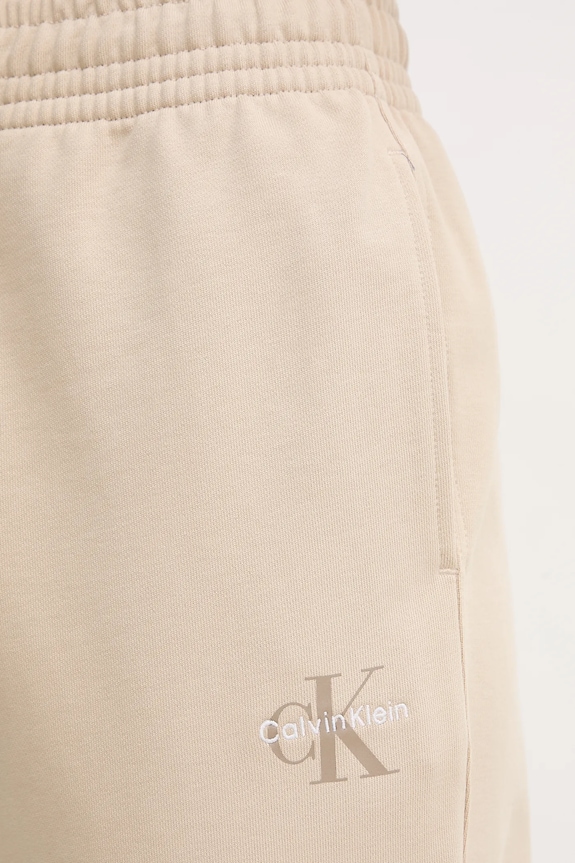 Calvin Klein Jeans spodnie dresowe beżowy LV047B235G