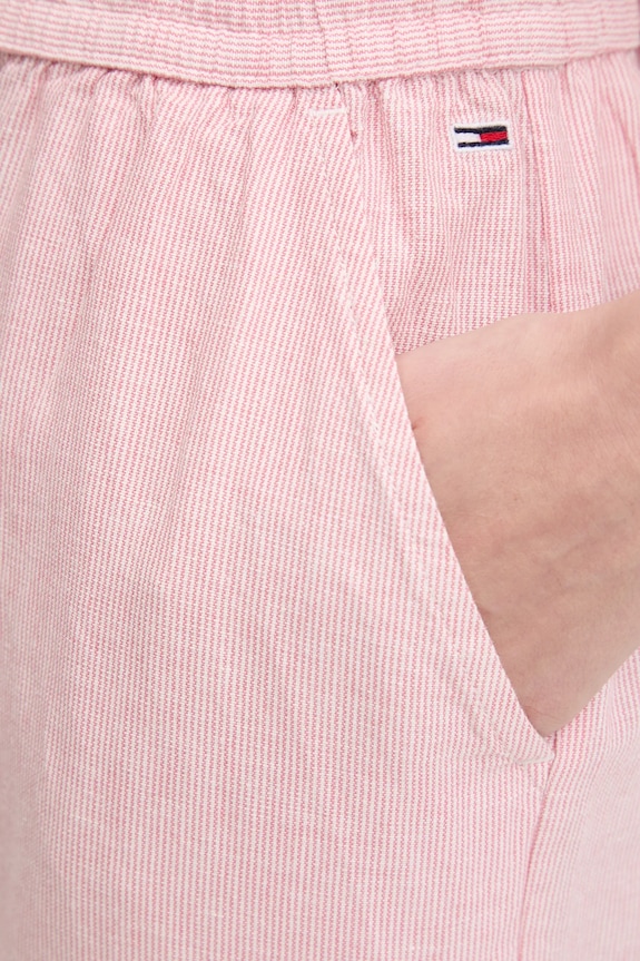 Hlače s dodatkom lana Tommy Jeans roza DW0DW20352