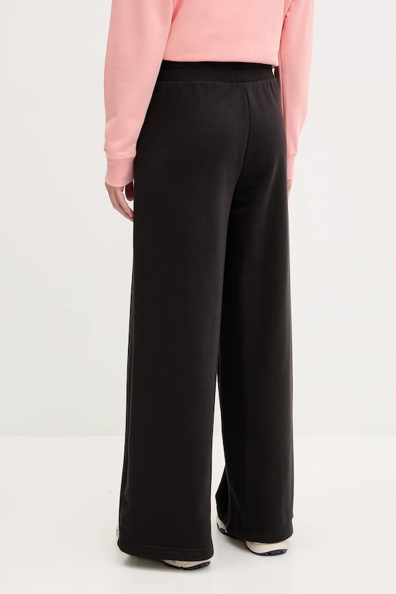 Ρούχα Παντελόνι φόρμας Puma 629754 μαύρο