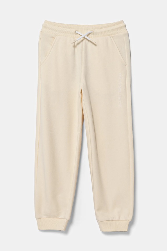 Tommy Hilfiger spodnie dresowe dziecięce dzianina beżowy KG0KG08325.116.122.PPYA