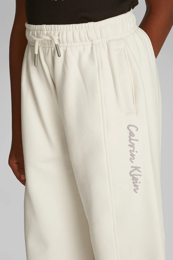 Dječji donji dio trenirke Calvin Klein Jeans IG0IG02876.128.176.PPYA bež
