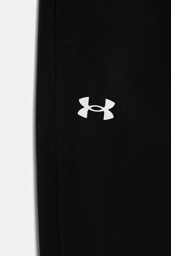 DÍVKA Dětské tepláky Under Armour Rival Woven Jogger 1384207 černá