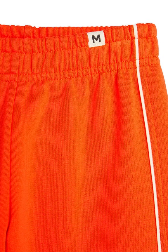 Dětské tepláky Mini Rodini Plain piping oranžová 2513010742