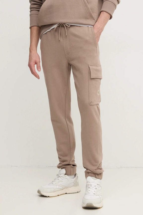Calvin Klein Jeans spodnie dresowe bawełniane beżowy J30J326762