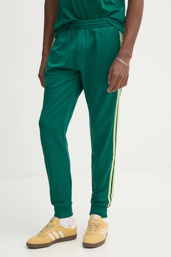 Oblečenie Tepláky adidas Originals SST TP JP1224 zelená