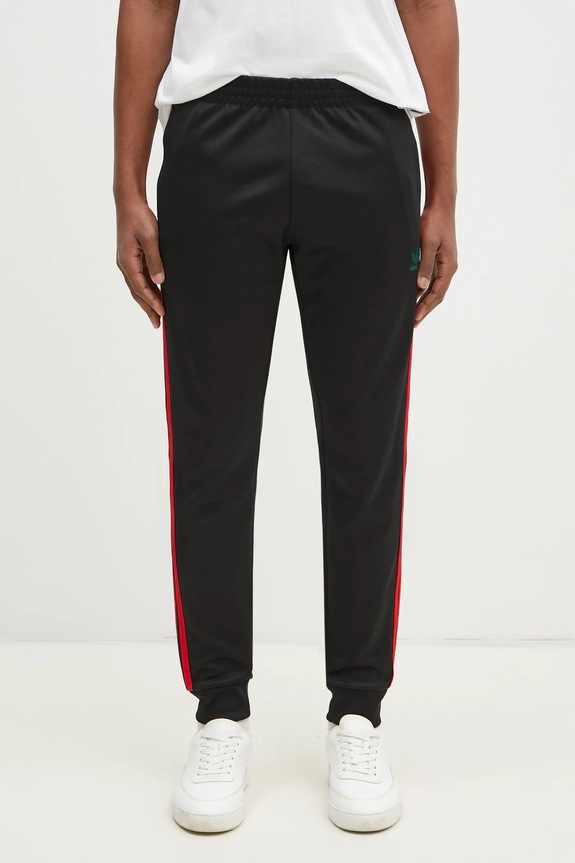 Спортен панталон adidas Originals SST TP щампа черен JP1225