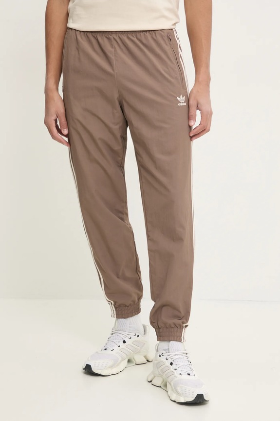 adidas Originals spodnie dresowe Firebird aplikacja beżowy JP1024