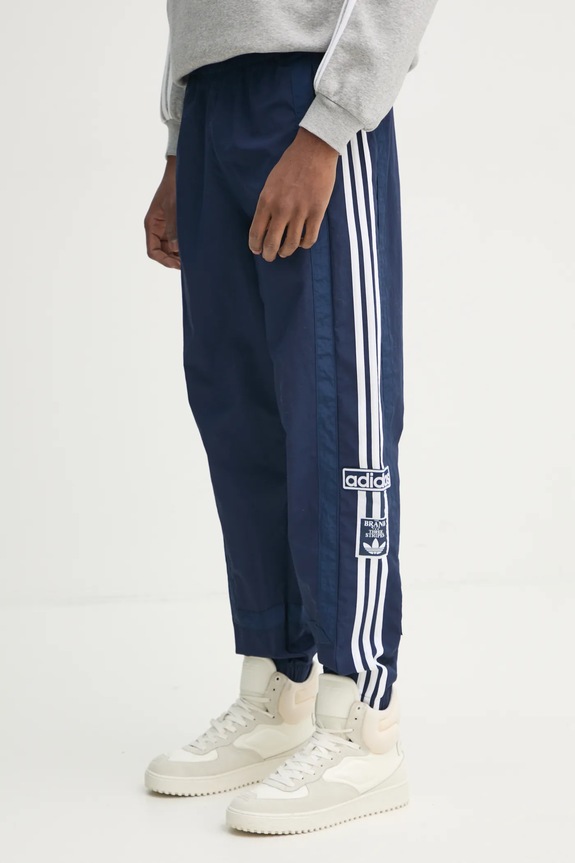 Tepláky adidas Originals Adibreak látka tmavomodrá JD4258