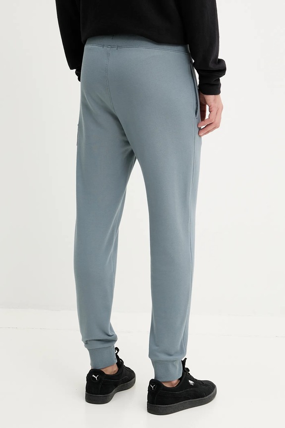 Abbigliamento C.P. Company pantaloni della tuta di cotone 18CMSP017A005086W blu