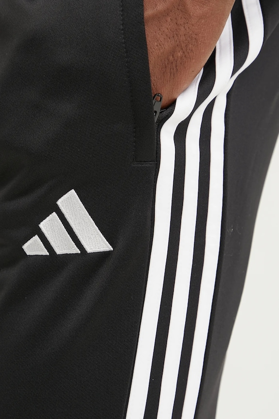 Odzież adidas Performance spodnie dresowe Tiro Essentials JC5464 czarny