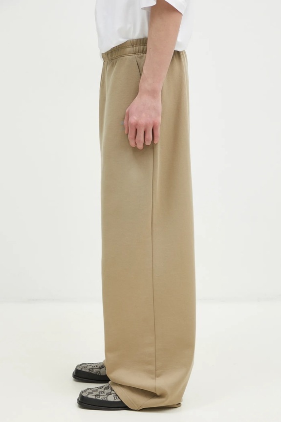 VETEMENTS spodnie dresowe Oval Logo UA66SP600T beżowy SS25