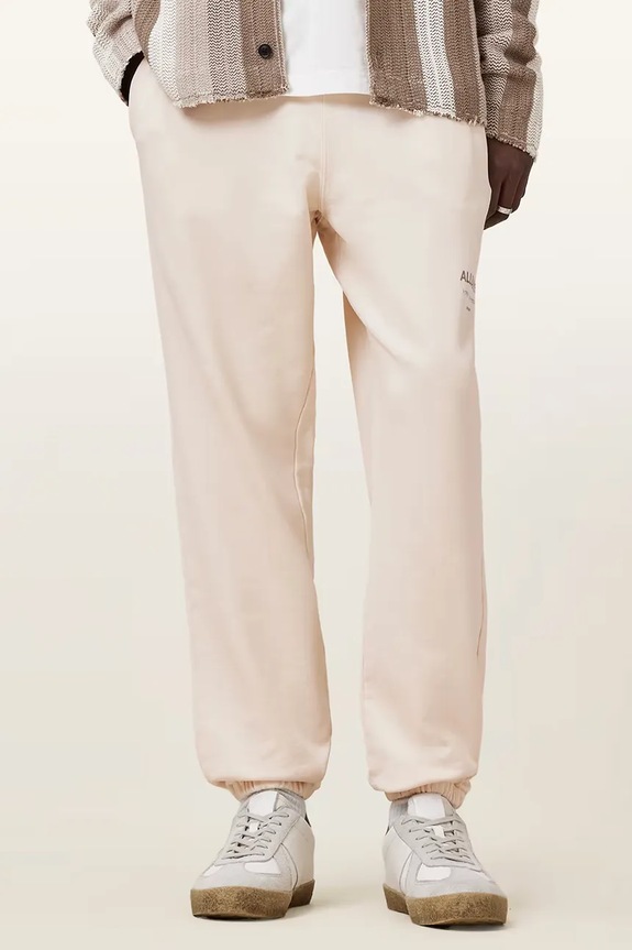 Bavlněné tepláky AllSaints UNDRGRND M031TB béžová SS26