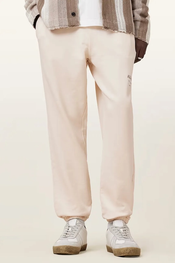Bavlněné tepláky AllSaints UNDRGRND M031TB béžová SS26