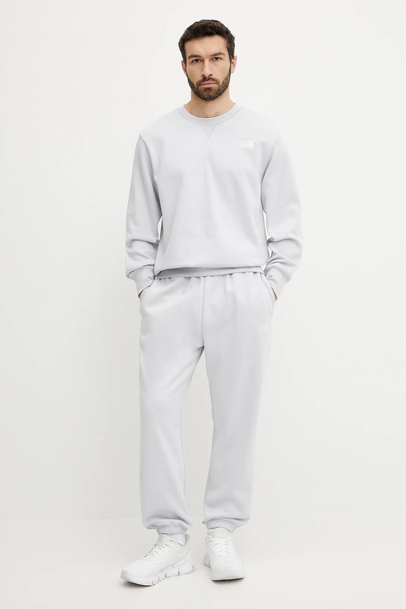 Tepláky The North Face Essential Relaxed NF0A8C1F0TI1 modrá SS25