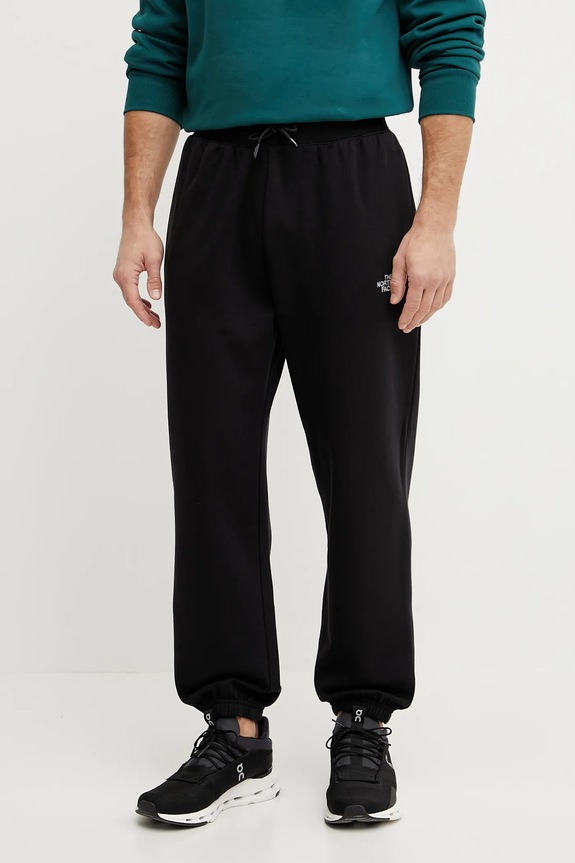 The North Face pantaloni della tuta Essential Relaxed applique nero NF0A8C1FJK31