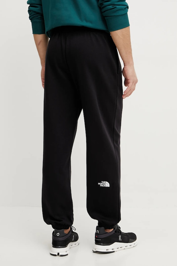 Abbigliamento The North Face pantaloni della tuta Essential Relaxed NF0A8C1FJK31 nero