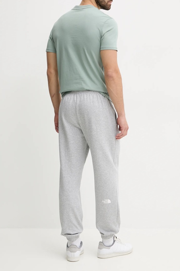 Odzież The North Face spodnie dresowe Simple Dome NF0A8C1WDYX1 szary