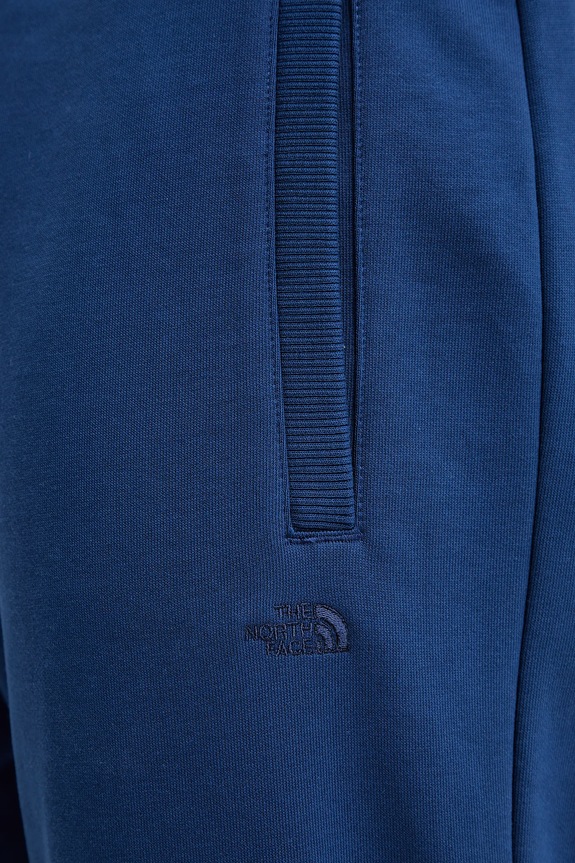 The North Face spodnie dresowe bawełniane Dome Relaxed granatowy NF0A8C3SD1R1