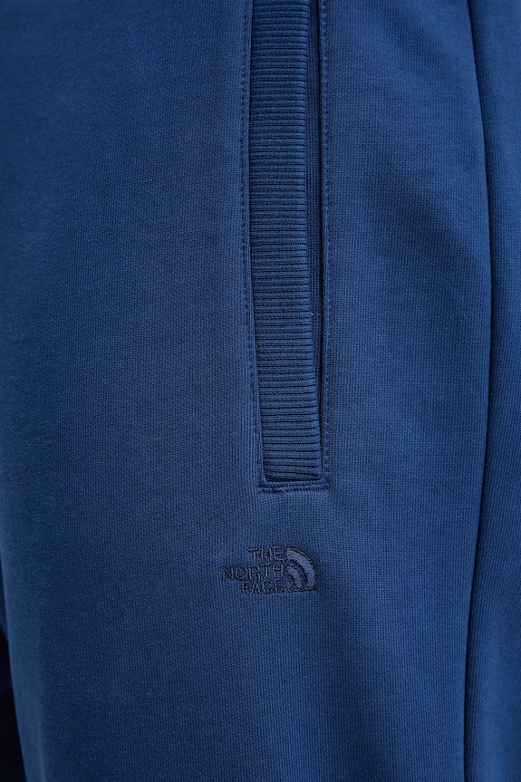 The North Face spodnie dresowe bawełniane Dome Relaxed granatowy NF0A8C3SD1R1